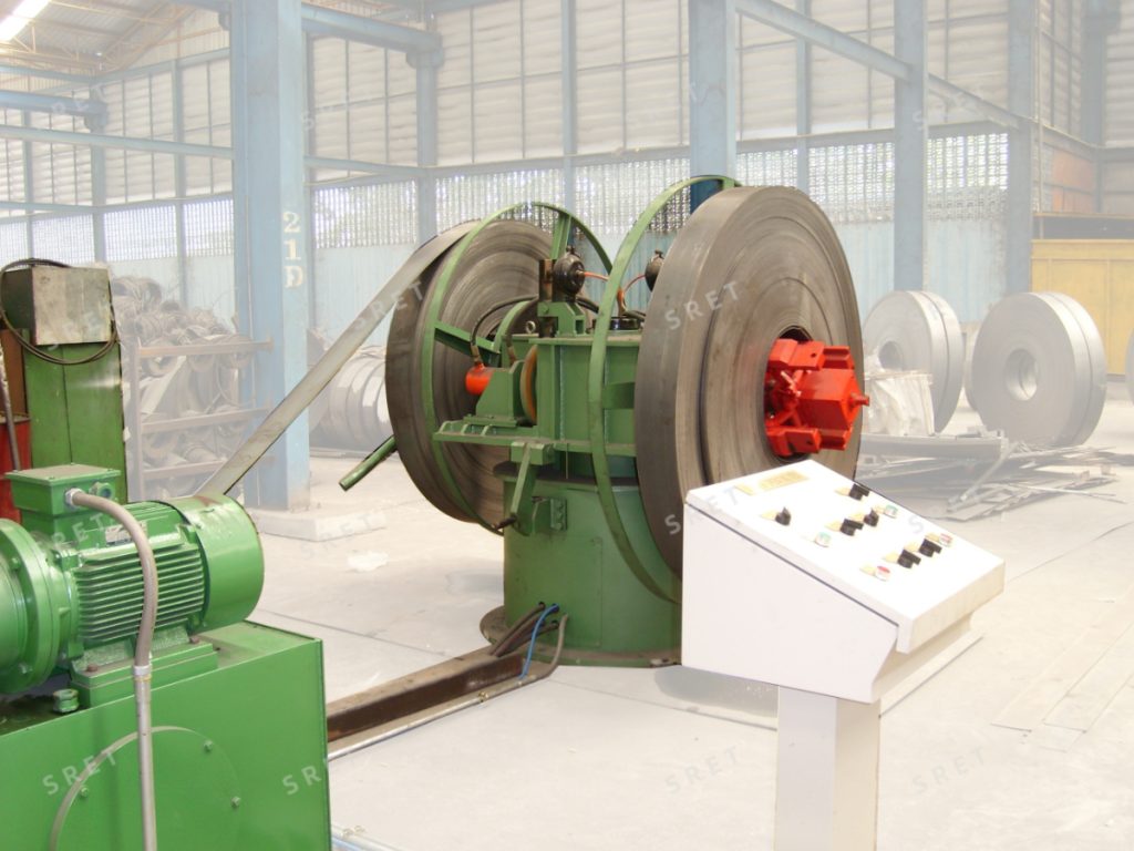 Double-drum rotatable uncoiler for an ERW tube mill line